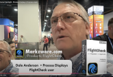 Preflight & Report on Documents: Prepress, Pressroom, Bindery Manager on FlightCheck, 780x435. Dale Anderson of Process Displays (PD Instore) with PRINTING United Expo in the Background.