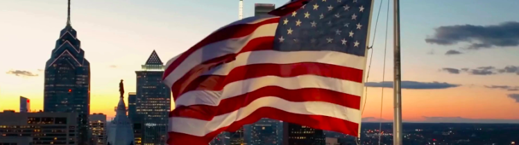 Flag of United States of America with a large city background
